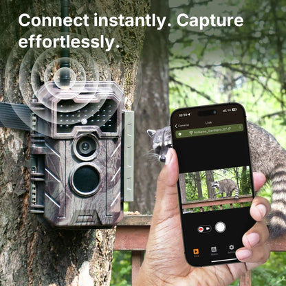 GardePro E7 WiFi trail camera connected to a smartphone for fast wireless preview, showing instant live view of a raccoon with seamless app pairing.