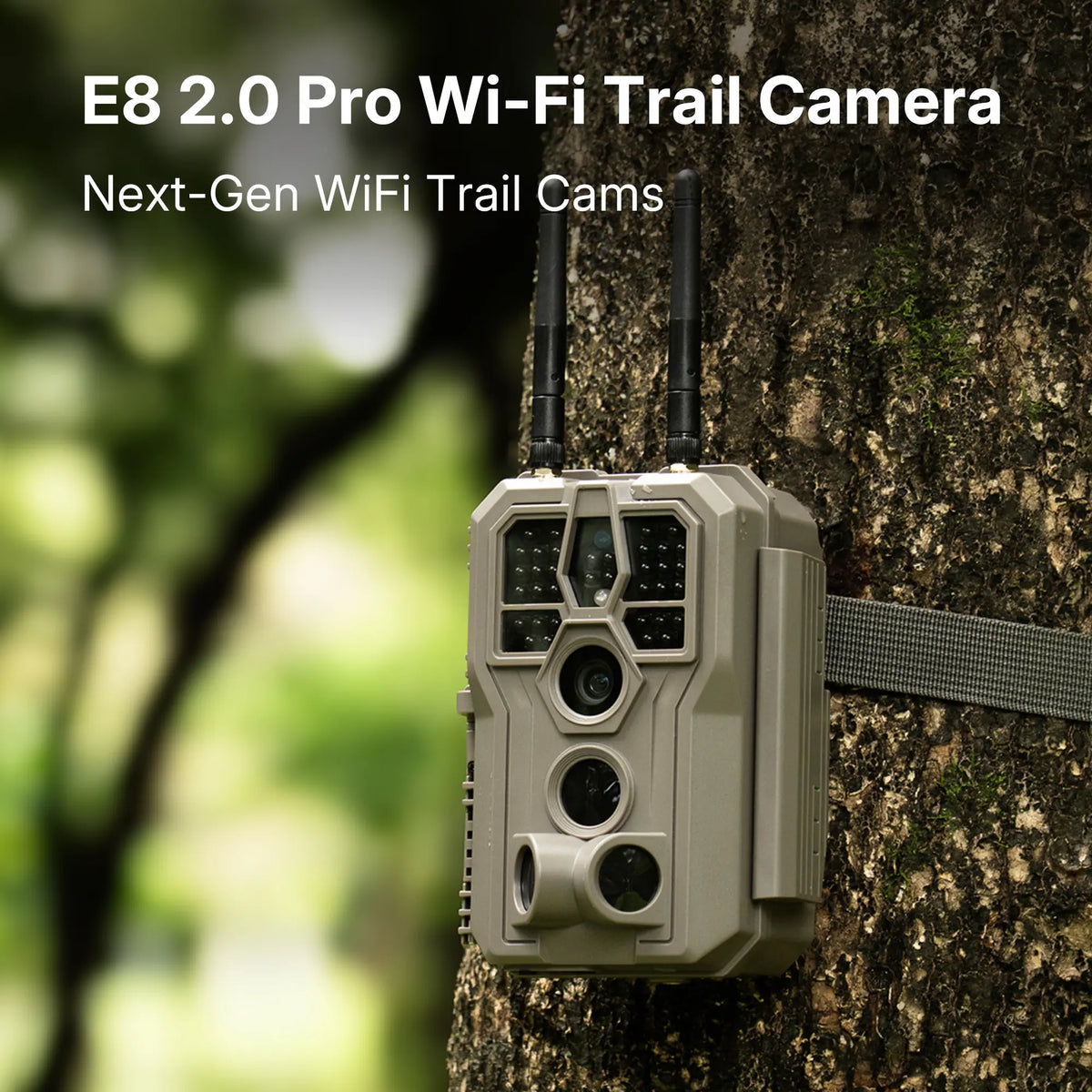 E8 2.0 Pro Wi-Fi Trail Camera attached to a tree with greenery in the background